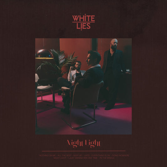 CD cover for White Lies’ “Night Light” featuring three men in a dimly lit room.