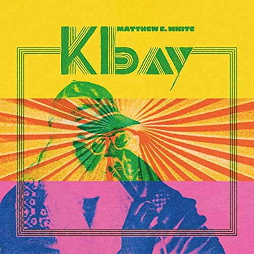 Album cover featuring Matthew E. White with stylized green text over colorful sunburst background.
