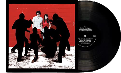 The White Stripes “White Blood Cells” vinyl record with red cover art.