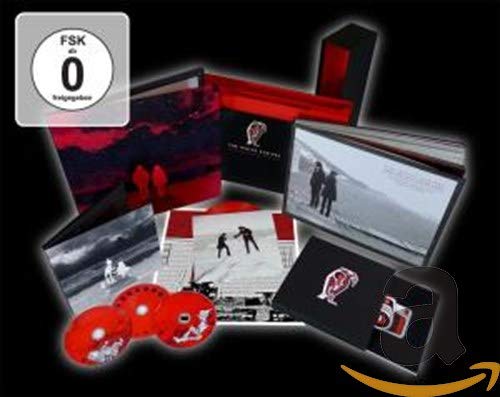 White Stripes boxset with DVDs, vinyl records, and black and white imagery.