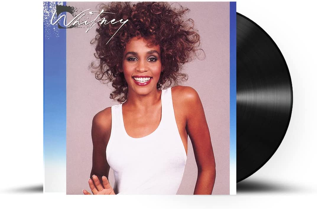 Whitney Houston vinyl record with cover featuring a portrait of the artist.