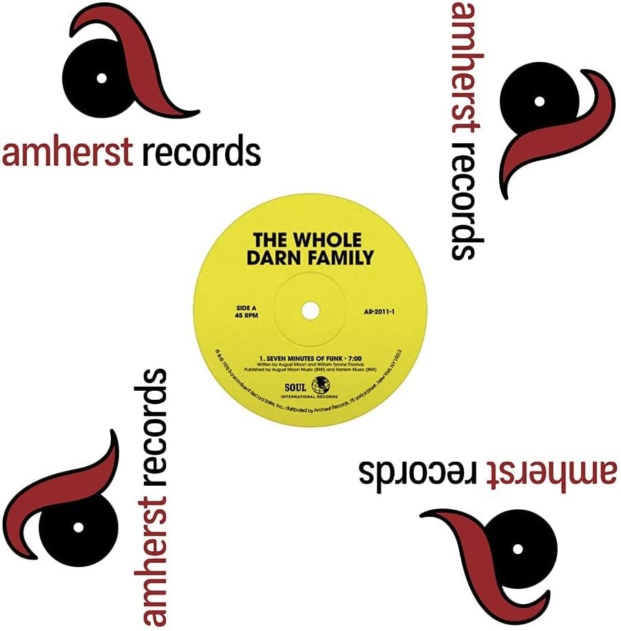 Yellow vinyl record label with red swirl designs and black text.