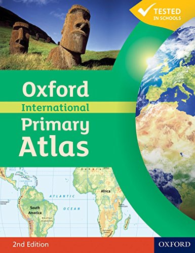 Cover of Oxford International Primary Atlas featuring Moai statues, a globe, and world maps.