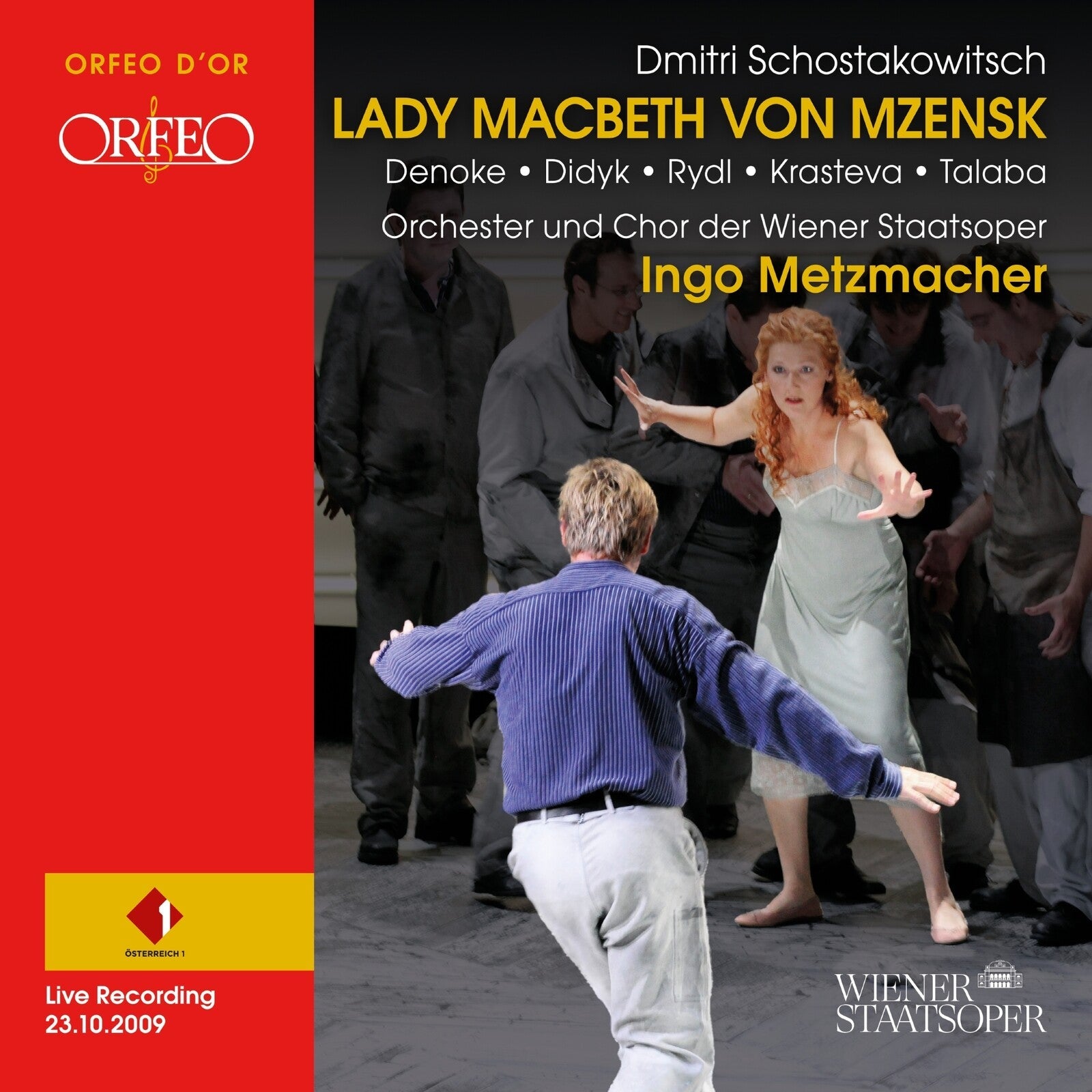 CD cover featuring a dramatic opera scene with performers in a dimly lit setting.