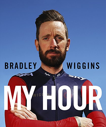 Bradley Wiggins in cycling gear, arms crossed, book cover "My Hour".