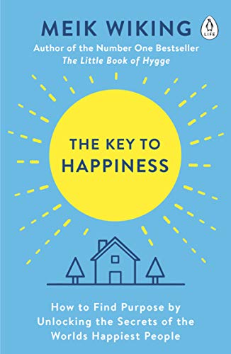 Book cover with yellow sun, house illustration, and blue background.