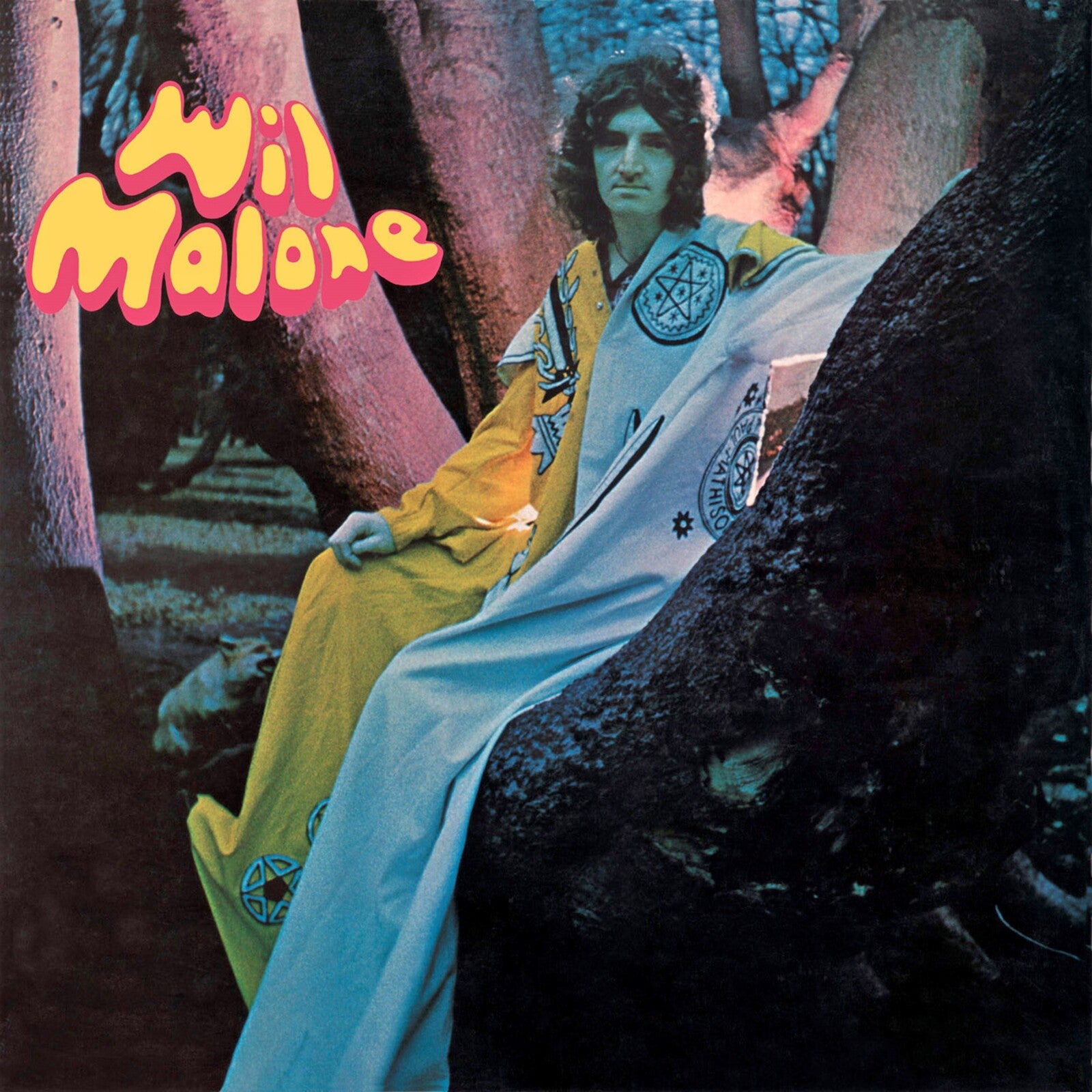 Album cover featuring Wil Malone, a man in yellow and white clothing.