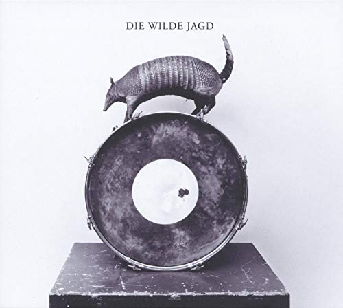 Armadillo on a drum, album cover, black and white image, vinyl record indicated.