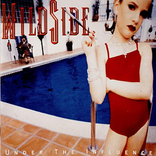 Album cover: woman in red swimsuit by a poolside, man in background.