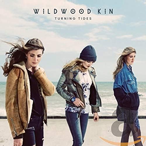 CD cover for Wildwood Kin’s “Turning Tides” featuring three women by the sea.