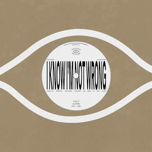 White vinyl record label with barcode and eye-shaped graphic.