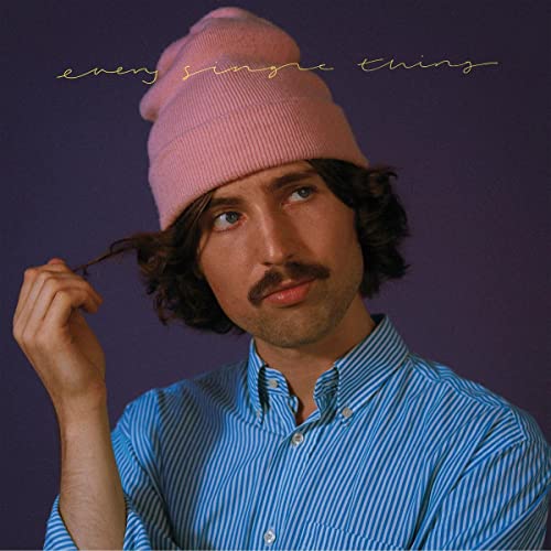 Will Joseph Cook album cover: man with pink beanie, blue shirt.