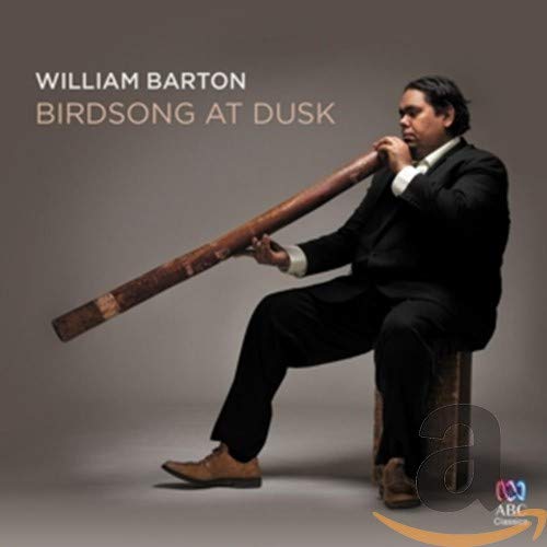 William Barton playing a didgeridoo, album cover for "Birdsong at Dusk.