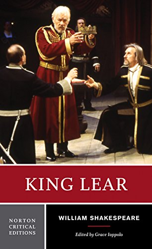Book cover for "King Lear" featuring a theatrical scene with actors.