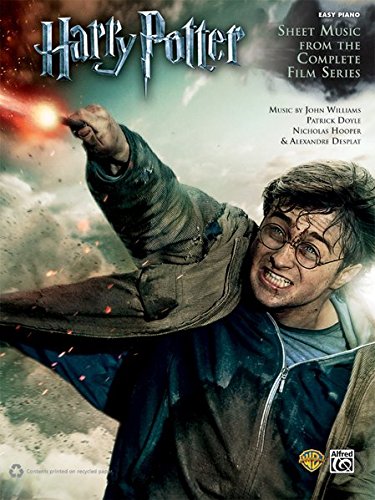 "Harry Potter sheet music cover featuring Daniel Radcliffe as Harry Potter with a lit wand."