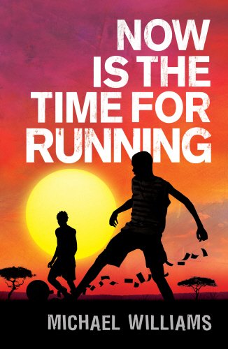 Book cover with silhouetted boys playing soccer at sunset, title "Now is the Time for Running".