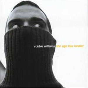 Robbie Williams album cover: close-up of face partially obscured by knitwear.