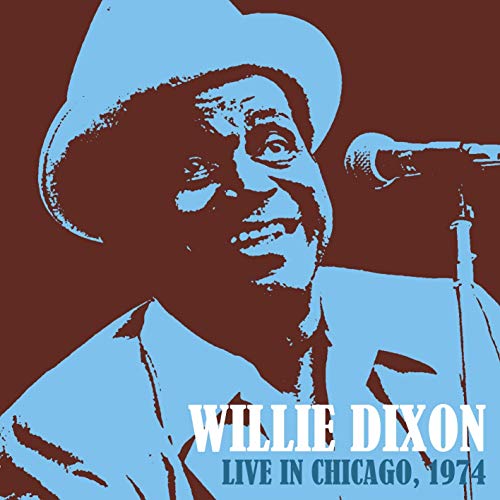 Blue-toned portrait of Willie Dixon singing into a microphone, 1974.