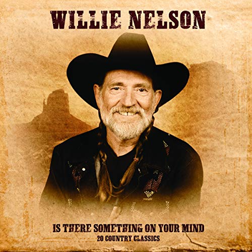 Willie Nelson portrait on album cover with desert landscape background.