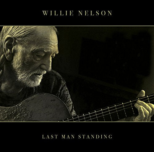 Willie Nelson vinyl album cover featuring a man playing guitar, black background, gold text.