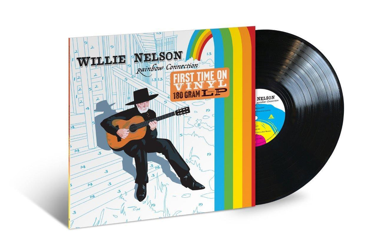 Willie Nelson album cover and vinyl record with rainbow design.