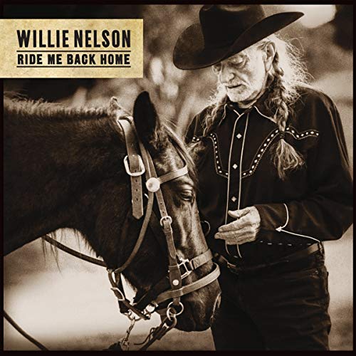"Willie Nelson album cover, sepia-toned, featuring Willie Nelson standing beside a horse."