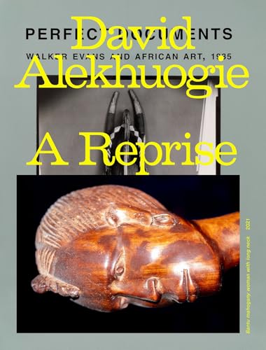 Book cover featuring African art, including a carved wooden head and masked figure.
