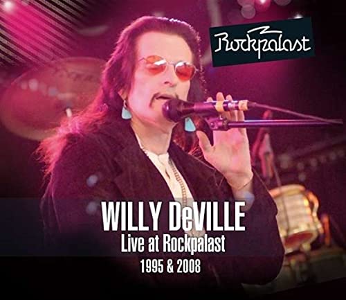 Willy DeVille in sunglasses singing into a microphone on CD cover.