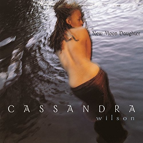 Woman emerging from water on album cover for Cassandra Wilson’s “New Moon Daughter.”