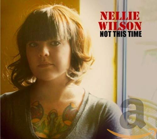 CD cover featuringS featuring Nellie Wilson withS with bangs and a chest tattoo.