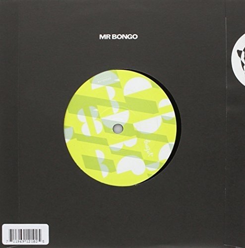 A vinyl record sleeve with a green and white patterned disc.