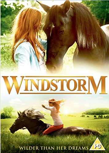 A girl with red hair interacts with a dark horse on a DVD cover.