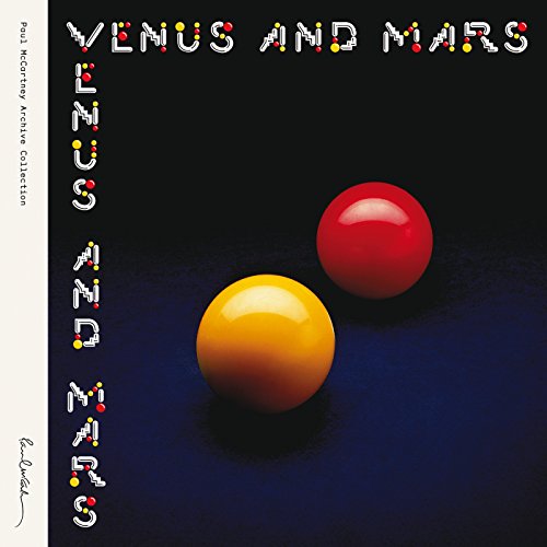 Wings’ “Venus and Mars” vinyl album cover with red and yellow spheres.