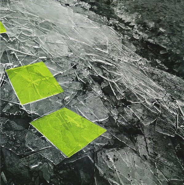 Abstract album cover with cracked ice texture and green squares.