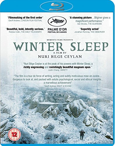Blu-ray cover for Winter Sleep showing a snow-covered landscape with a stone building.