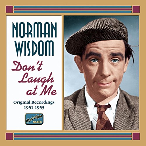 CD cover featuring a portrait of Norman Wisdom wearing a flat cap and tie.