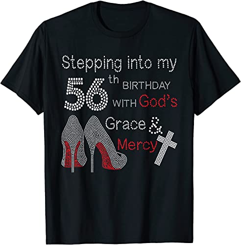 Black t-shirt with rhinestone designs of heels, numbers, and a cross.