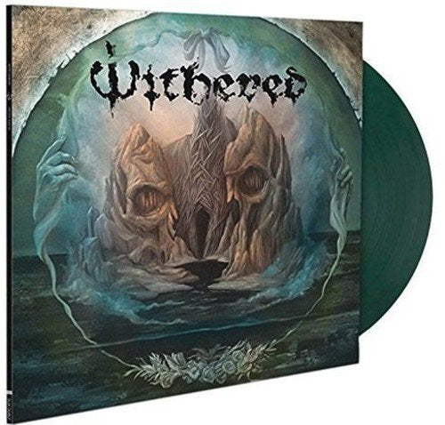 Vinyl record cover featuring a skull-shaped rock formation and a dark green vinyl disc.
