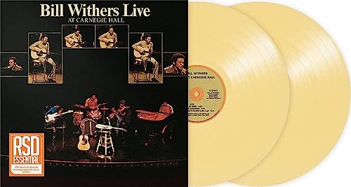 Bill Withers Live at Carnegie Hall album cover next to two custard-colored vinyl records.