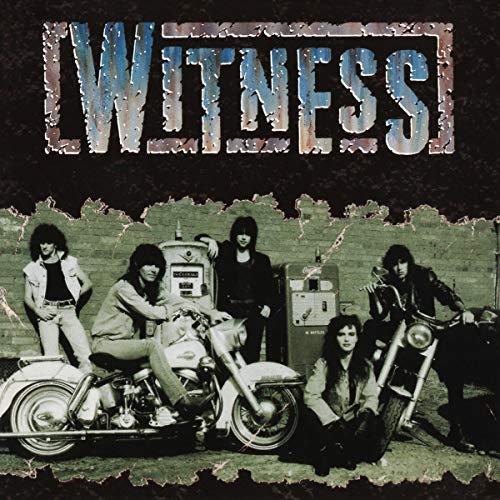 Album cover for "Witness" featuring a band with motorcycles and a brick wall.