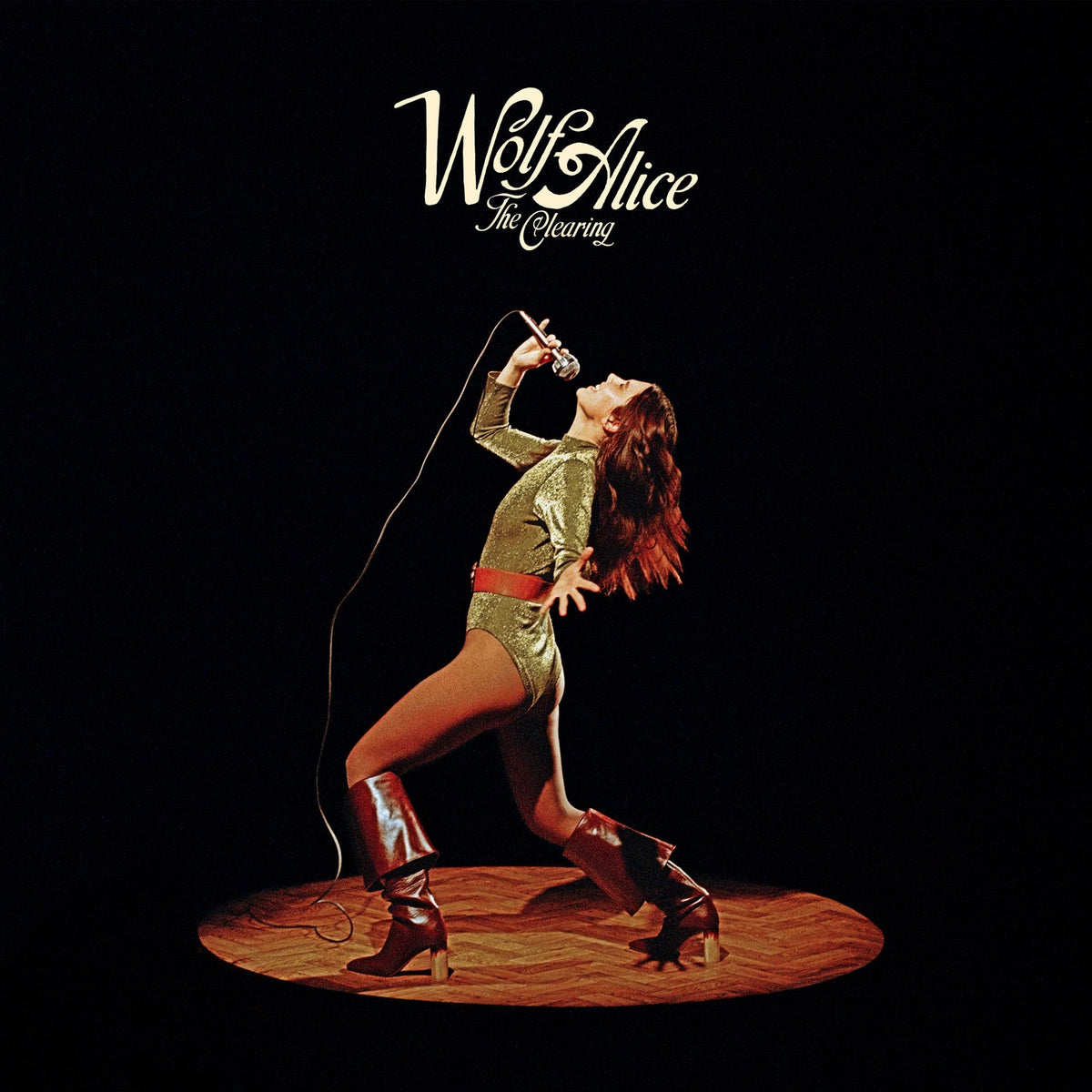 Vinyl album cover of "Wolf Alice - The Clearing" with abstract, earthy-toned artwork. Bone-colored LP.