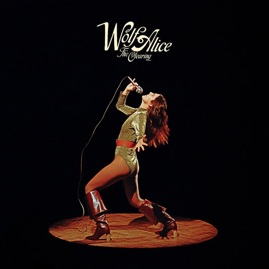 Album cover for Wolf Alice’s “The Clearing” featuring a singer with a microphone.