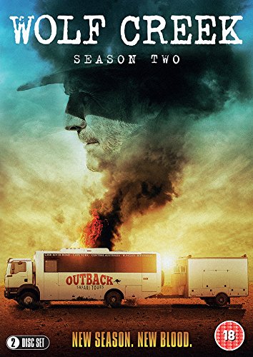DVD cover for "Wolf Creek: Season Two" featuring a man's shadowy face and burning caravan.