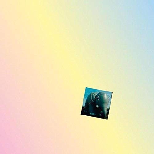 Vinyl record cover featuring a blue elephant against a gradient background.