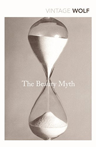 Book cover with hourglass and text "The Beauty Myth" on a beige background.