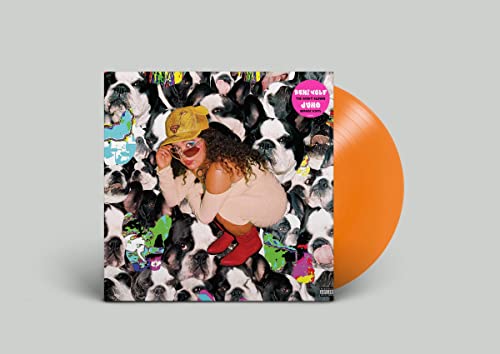 Orange vinyl record and cover featuring a woman against a background of dogs.