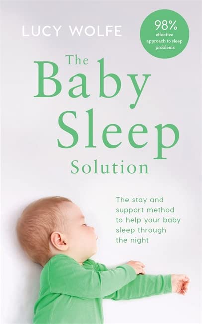 Book cover featuring a sleeping baby in green pajamas.