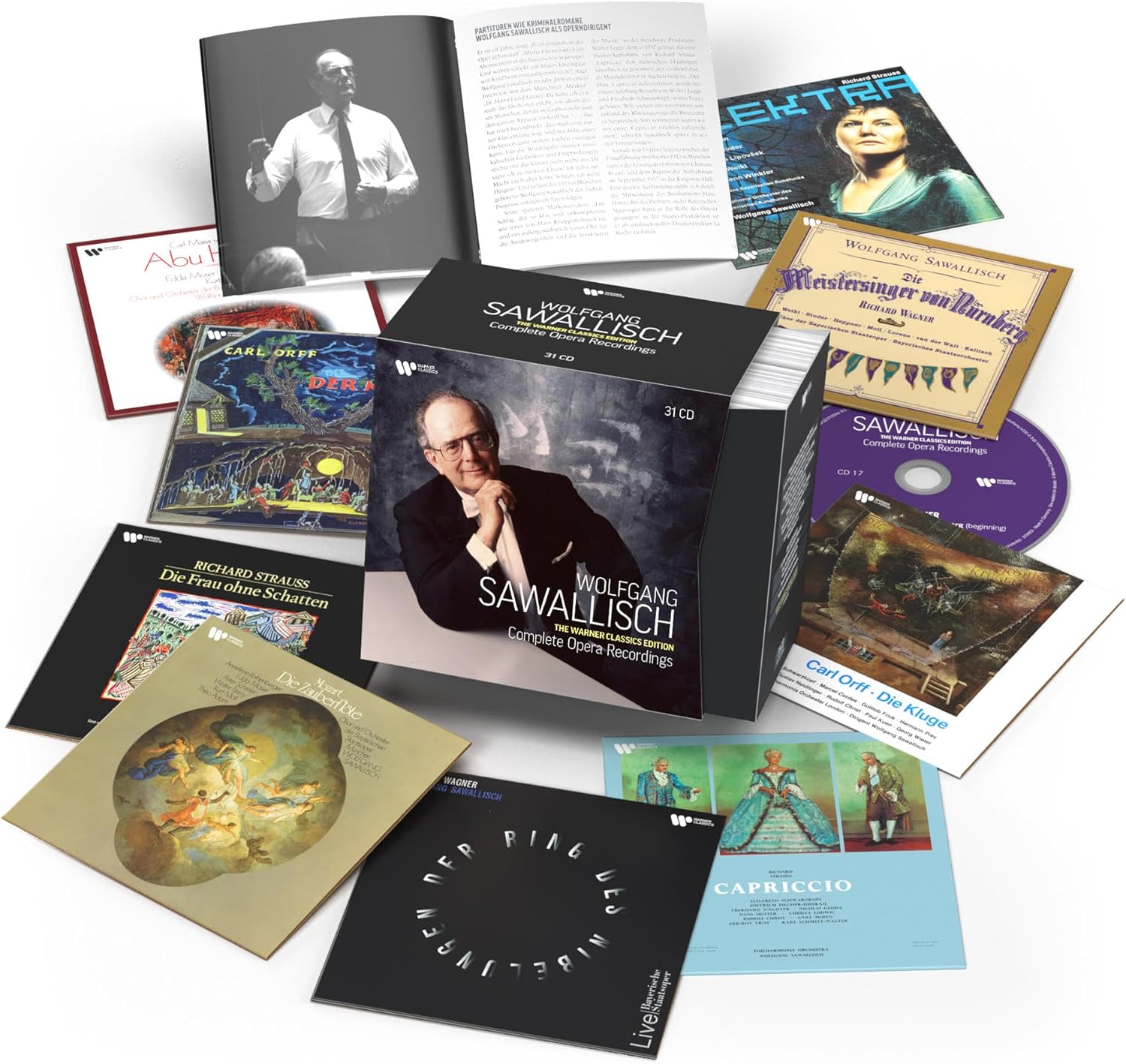 Stack of Wolfgang Sawallisch CDs and booklets with classical music imagery.