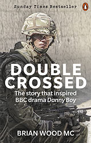 Book cover: soldier in helmet, title "Double Crossed" in large white letters.