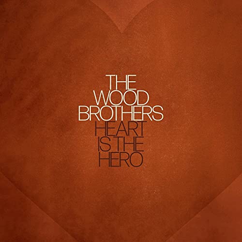 Album cover for The Wood Brothers’ “Heart is the Hero” with a heart shape.